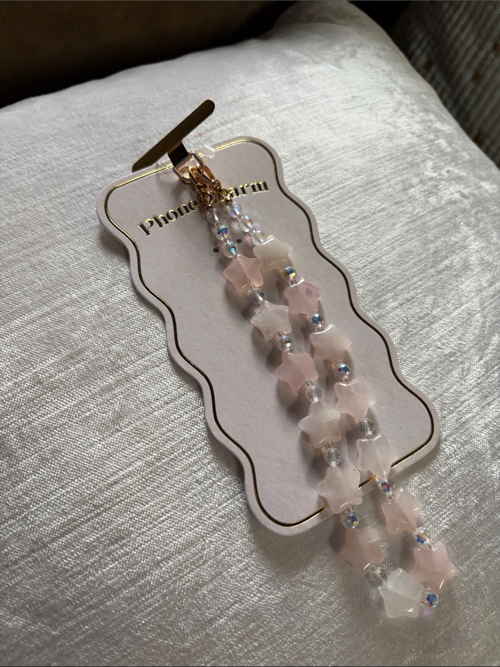 Anthropologie Pink Star Beaded Phone Charm
